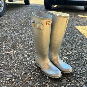 Women silver glitter Hunter boots.